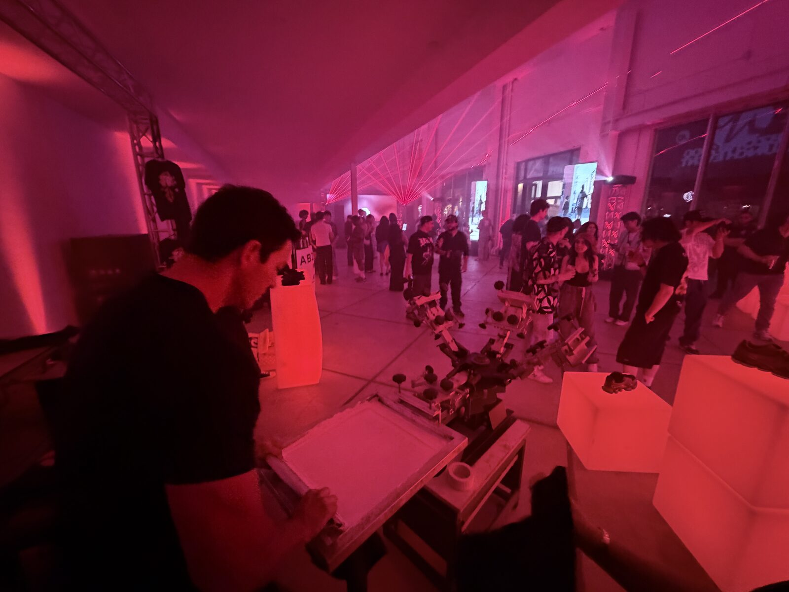Live printing rental at an evening party with guests watching