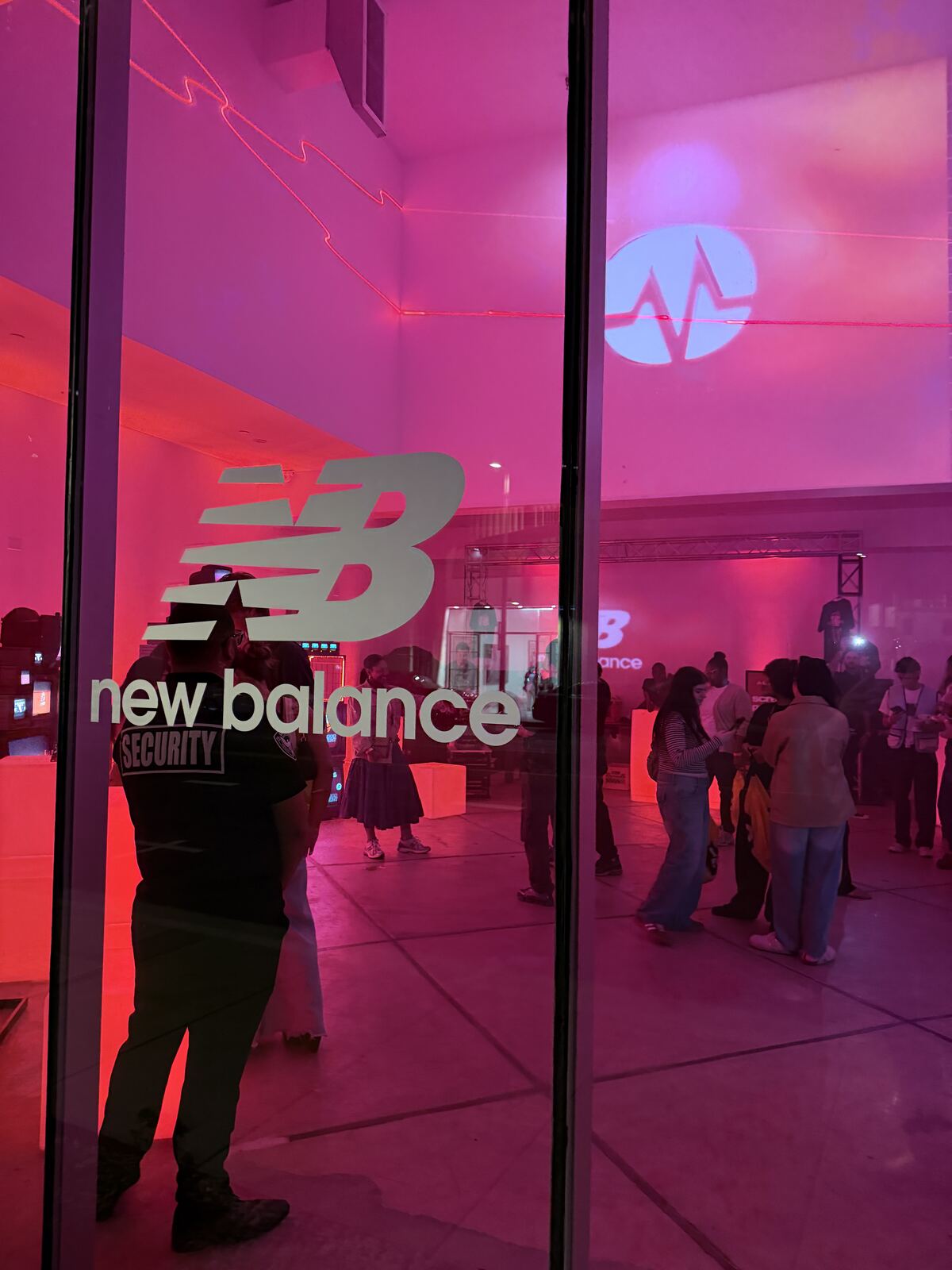 Neon booth signage and display equipment at an event